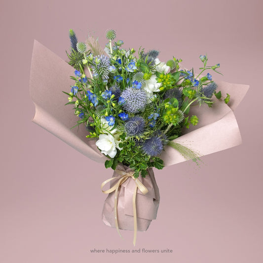 Breathing in blue celebration flower bouquet