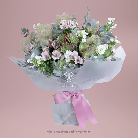 Peach drizzle flower arrangement